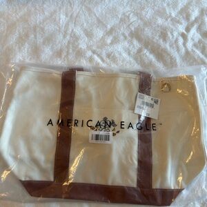 American Eagle Outfitters Snoopy Cream Canvas Tote with Brown Trim